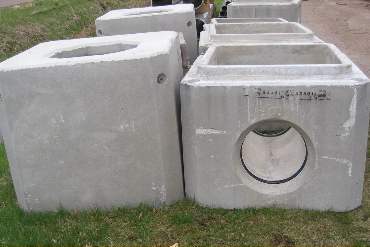 Illustrative sewer manholes and pipes in the Netherlands, not a Denver project.