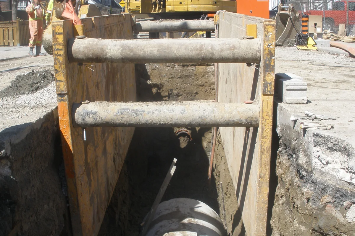 Illustrative large-diameter sewer pipe installation in Toronto, not a Denver project.